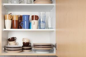 kitchen cabinet or cupboard for dishes photo