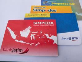 Sidoarjo, Jawa timur, Indonesia, 2022 - East Java bank passbook, btn, bri isolated on white background photo