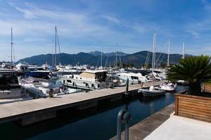 Tivat, Montenegro - October 20, 2020 Lots of luxury yachts, motor and sailing in the port, marina. photo