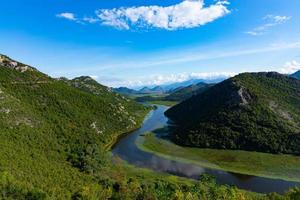 Green pyramid, a mountain on the Crnojevich River or Black River, near the shores of Lake Skadar. Montenegro photo