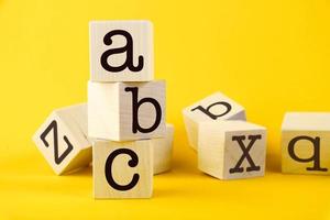 Wooden cubes with ABC text. Financial, management, education, business and economic concepts. photo