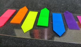 Tiny colorful sticky notes. photo