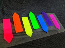 Tiny colorful sticky notes. photo