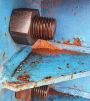 Close up photo of bolt and nut connection that joins steel plate for launcher gantry.