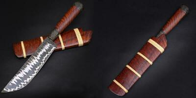 cuchillo de camping de damasco de acero inoxidable laminado personalizado en la carcasa de madera estampada de tigre natural sobre fondo negro hecho a mano de tailandia foto