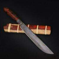 Damascus camping knife  custom in the natural Tiger patterned wood casing on black background handmade of Thailand