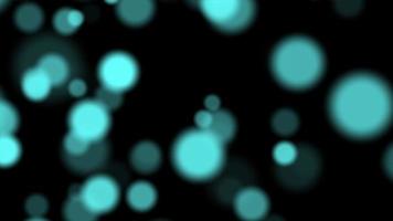 Soft focus light blue bokeh over black background - computer illustration graphic background concept photo