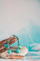 Jewelry with natural synthetic stone bracelet. Beautiful semiprecious stone beads photo