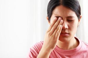 Woman eyestrain and migraine headache photo