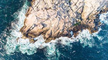 Top Down view of the Lighthouse built on sea rock- Peggy's Cove, Nova Scotia, Canada photo