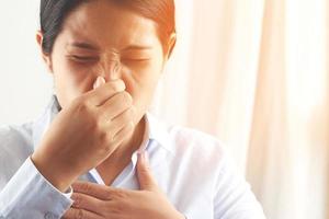 A foul smell when breathing may be caused by. 1. Infections in the nasal cavity such as colds, flu, sinusitis. photo