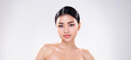 Portrait face shot of Young Asian 20s beautiful Woman open shoulder, look at camera photo