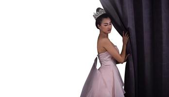 Concept of Beautiful Miss Pageant Queen Contest opens Stage Curtain as Door windows of New Opportunity, Life, chance, Work. Asian Woman Changes everything Next Day after winning Diamond Crown. photo