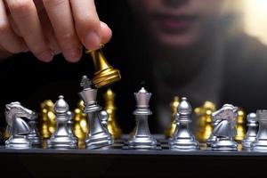 Business woman play Chess with close up Hand. Leader use strategy game to challenge competitor with intelligence leadership to move King to victory with management team idea fight, copy space photo