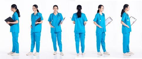 Full length 20s young Mix Race hospital nurse Woman, 360 front side rear back view, wear stethoscope blue uniform. Doctor female feels smile happy over white background isolated photo