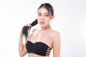 Half Body young adult Asian Woman, look at camera, beautiful Fashion make up open shoulder. photo