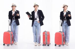 Full length 20s young Mix Race traveller guide tour Woman, sightseeing looking map with luggage, wear camera jeans hat. Tourist female travels feels smile happy over white background isolated photo