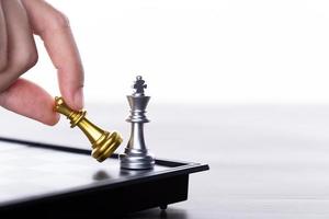 Business woman play Chess to success. Leader use strategy game to challenge competitor with intelligence leadership  power to move King to victory with management team idea battle to win, copy space photo