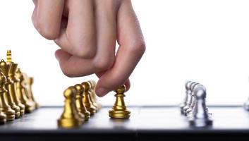 Business woman play Chess to success. Leader use strategy game to challenge competitor with intelligence leadership  power to move King to victory with management team idea battle to win, copy space photo