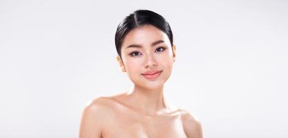 Portrait face shot of Young Asian 20s beautiful Woman open shoulder, look at camera photo