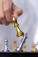 Business woman play Chess to success. Leader use strategy game to challenge competitor with intelligence leadership  power to move King to victory with management team idea battle to win, copy space photo