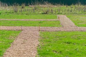 marking garden paths on the construction site. Countryside house building photo