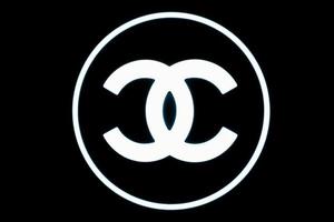 Moscow, Russia - December 20, 2021 - Chanel logo in front of fashion boutique in GUM Department store in the centre of Moscow. Luxuary brand of clothes, accessories and cosmetics photo