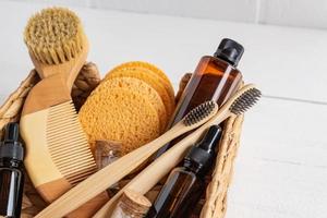 set of various bath accessories. Face brush, soap, comb, oil, shampoo and sponges. The view from the top with coppy space photo