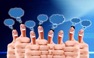 group of finger faces with social chat sign and speech bubbles photo