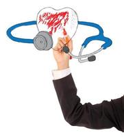 a stethoscope and a heart on a white background photo