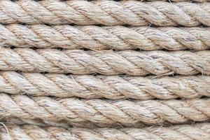 Close up view of twisted rope made of sisal. Background photo