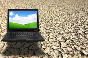 laptop demonstrates on arid land photo