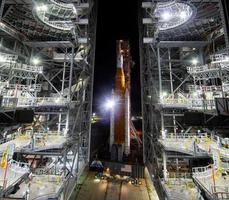 NASA Space Launch System rocket with the Orion spacecraft aboard is seen atop a mobile launcher photo