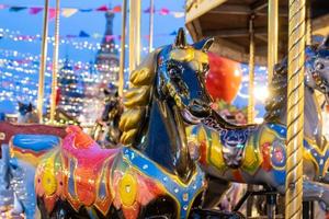 Horses of carnival Merry Go Round. Close up photo