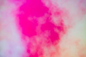 close up of colorful red smoke in the sky. Abstract background photo