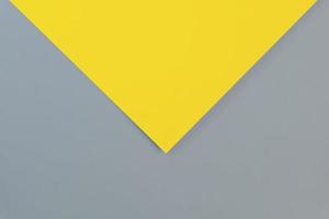 Flat lay in a trendy 2021 new colors. Illuminating Yellow and Ultimate Gray. Color of the Year 2021. photo