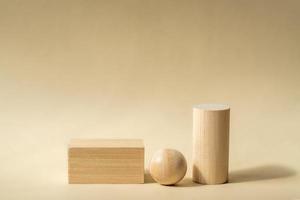 Empty wooden podiums of abstract geometric shapes for product presentations. Copy space for your design photo