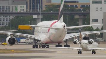 FRANKFURT AM MAIN, GERMANY JULY 17, 2017 - Aircraft of Emirates taxiing after landing. The Airbus A380 of Emirates Airlines arrived at Frankfurt, Germany video