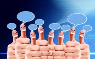 group of finger faces with social chat sign and speech bubbles photo