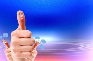 Happy group of finger faces as social network with speech photo