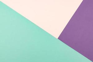 Abstract geometric paper background of pastel pink, blue and purple colors. Copy space for design photo