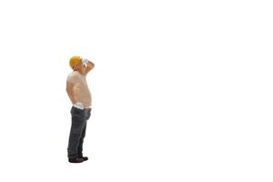 Miniature worker isolated on white background with clipping path photo