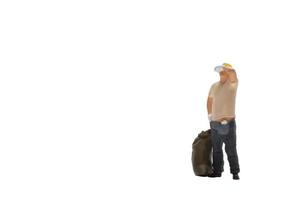 Miniature worker isolated on white background with clipping path photo