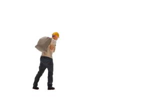 Miniature worker isolated on white background with clipping path photo