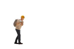 Miniature worker isolated on white background with clipping path photo