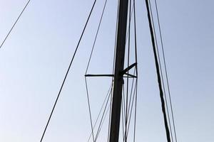 Tel Aviv Israel February 11, 2021. Ship masts against the blue sky. photo