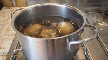 Boiling potatoes in saucepot video