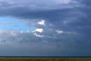 Clouds in the sky over the Mediterranean Sea. photo