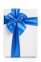 White gift Box with blue ribbon Isolated on white background photo