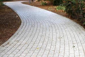 Pedestrian road in the city park. photo